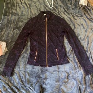 Size 8 purple and gold lululemon jacket.